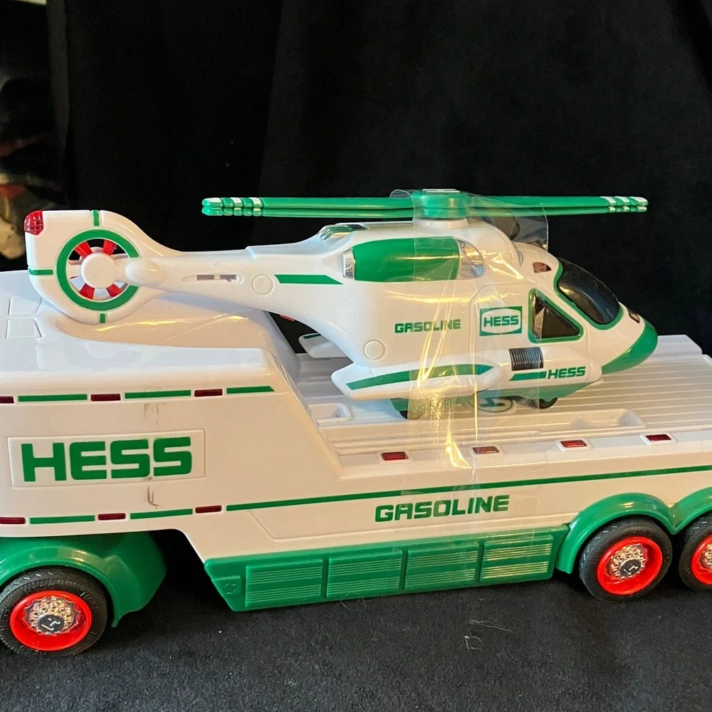 HESS Gasoline Semi Truck carrying helicopter Toy 2010 Toy plays sounds